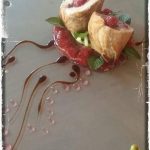 Sous Vide Χοιρινό φιλέτο γεμιστό με μετσοβέλα , chutney σύκο –σταφύλι και λικέρ καυτερής πιπεριάς.